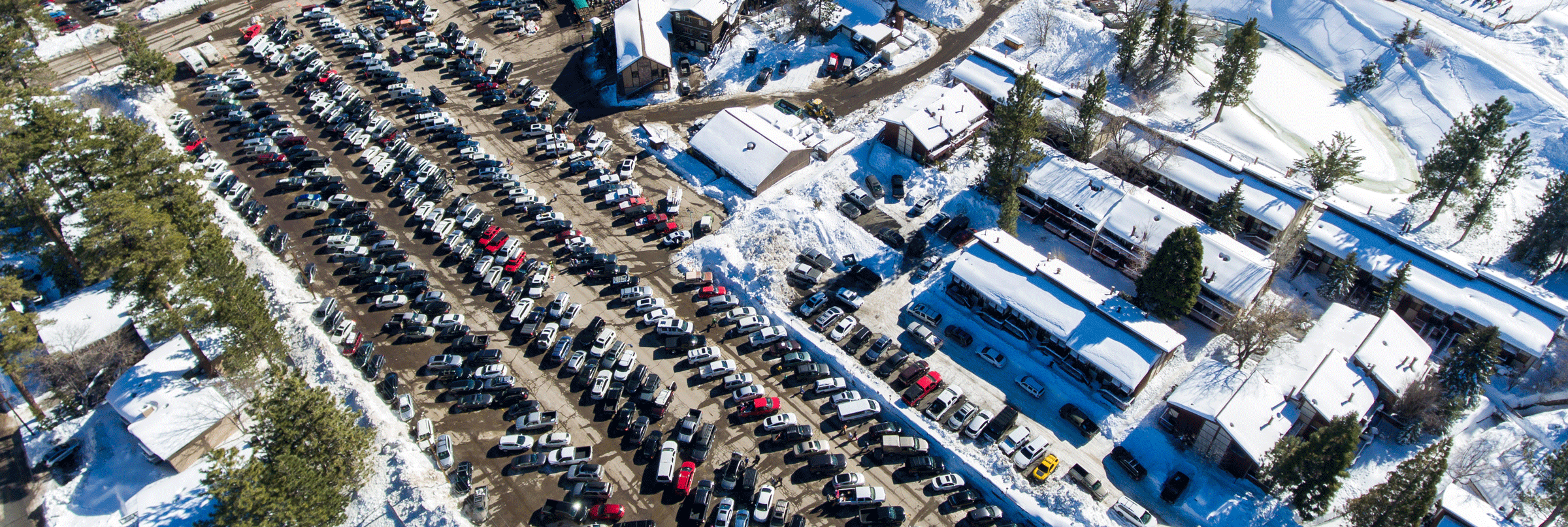 full parking lot at Snow Summit in the winter